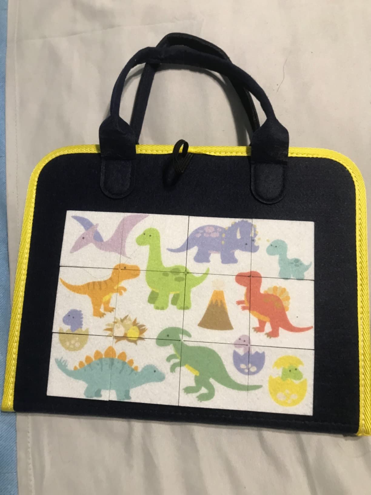 Avis Busy board Montessori rose pour bébé 1 à 4 ans : jouet éducatif avec puzzle