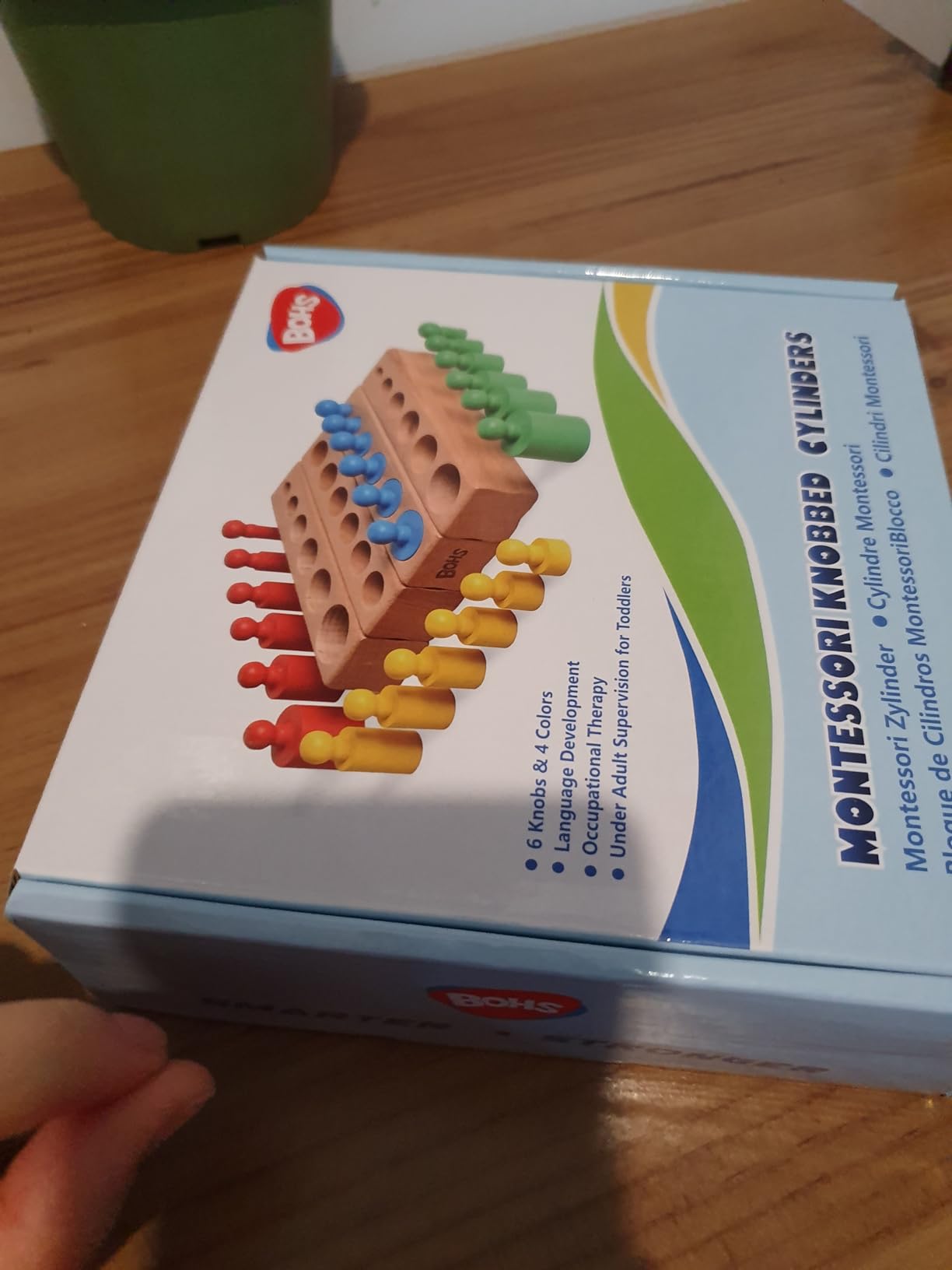 Avis Jouet éducatif Montessori : Cylindres à boutons pour développer la motricité fine des tout-petits