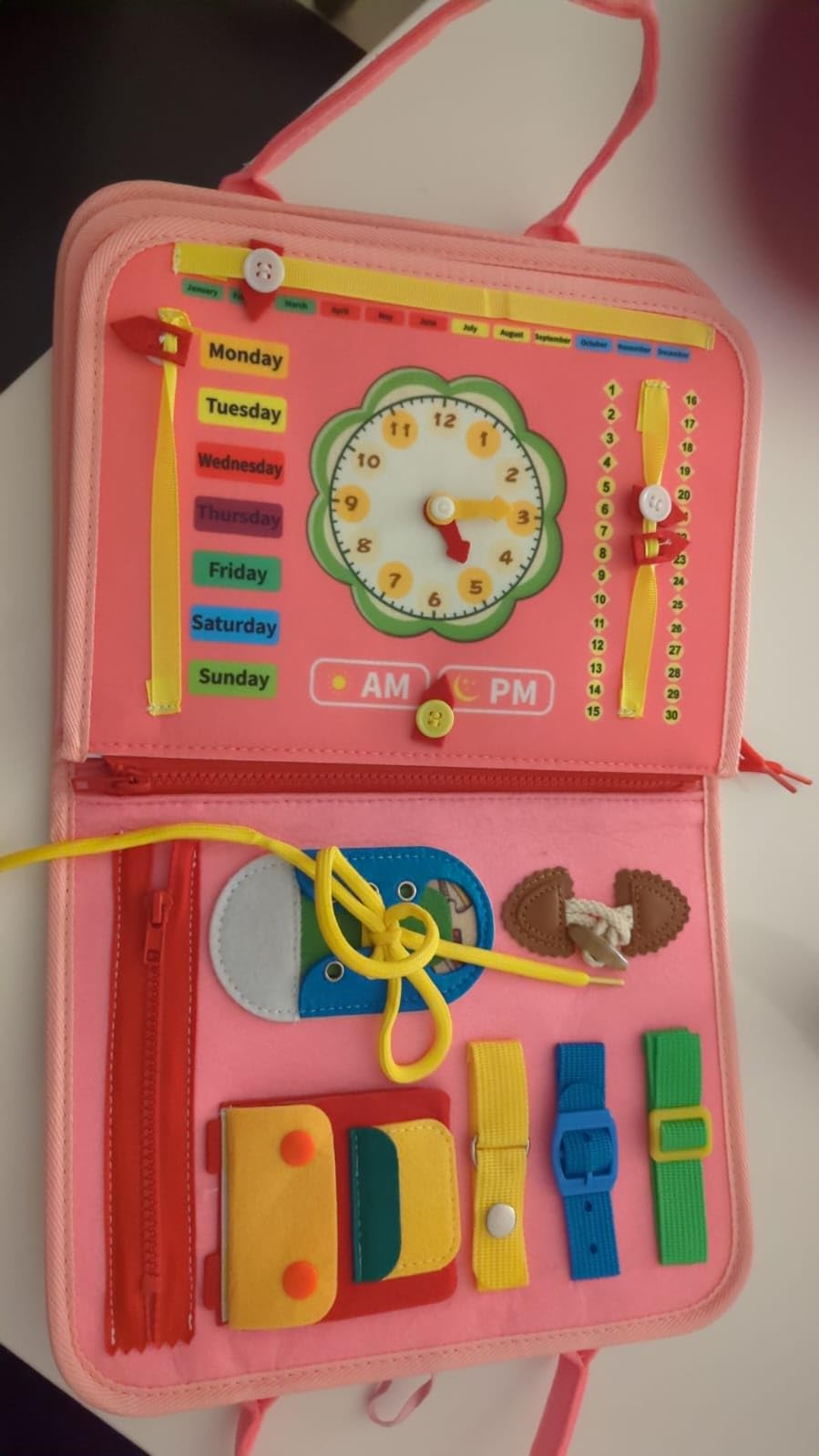 Avis Busy board Montessori rose pour bébé 1 à 4 ans : jouet éducatif avec puzzle