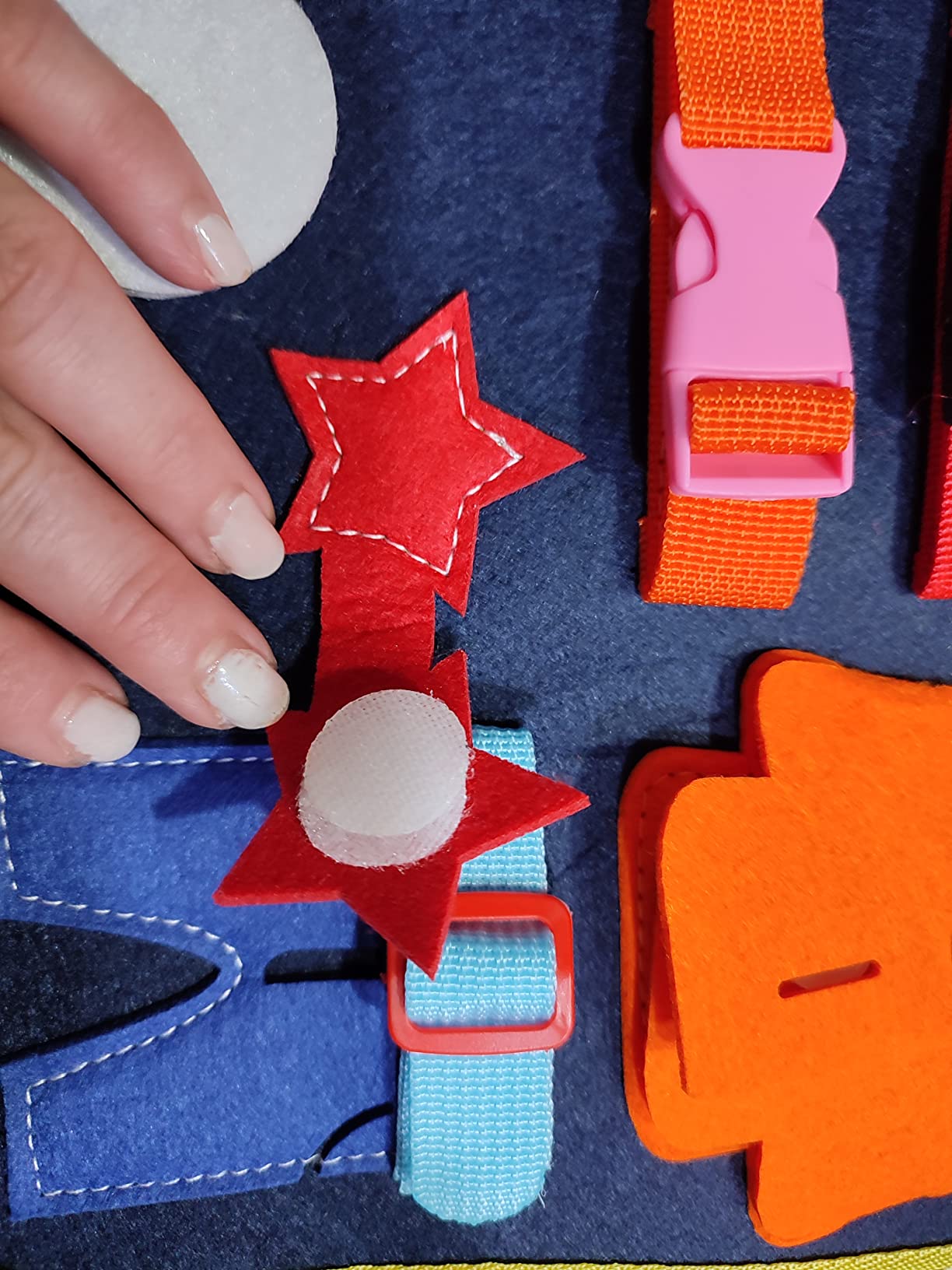 Avis Busy board Montessori rose pour bébé 1 à 4 ans : jouet éducatif avec puzzle