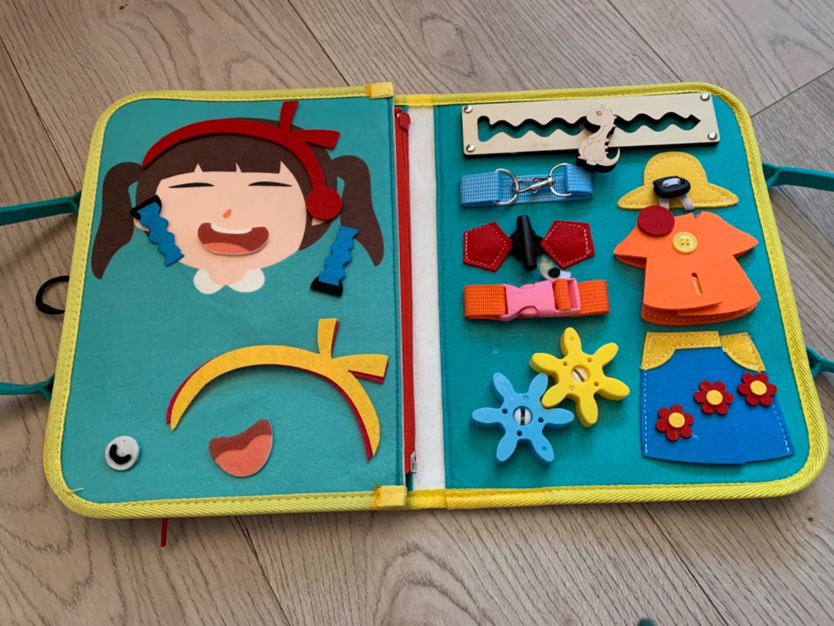 Avis Planche d’activité Montessori Achiyway 4 couches pour bébé 1-4 ans : un jouet éducatif pour voyage et motricité fine