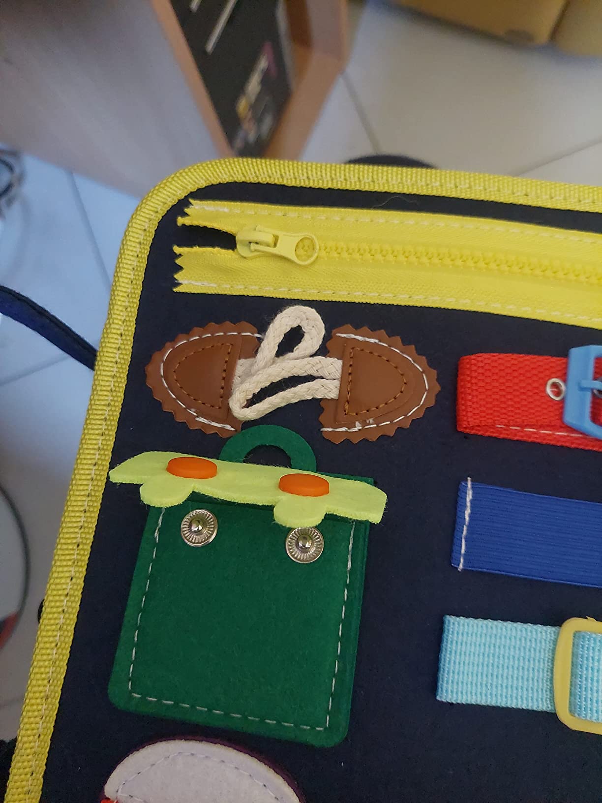 Avis Busy board Montessori rose pour bébé 1 à 4 ans : jouet éducatif avec puzzle