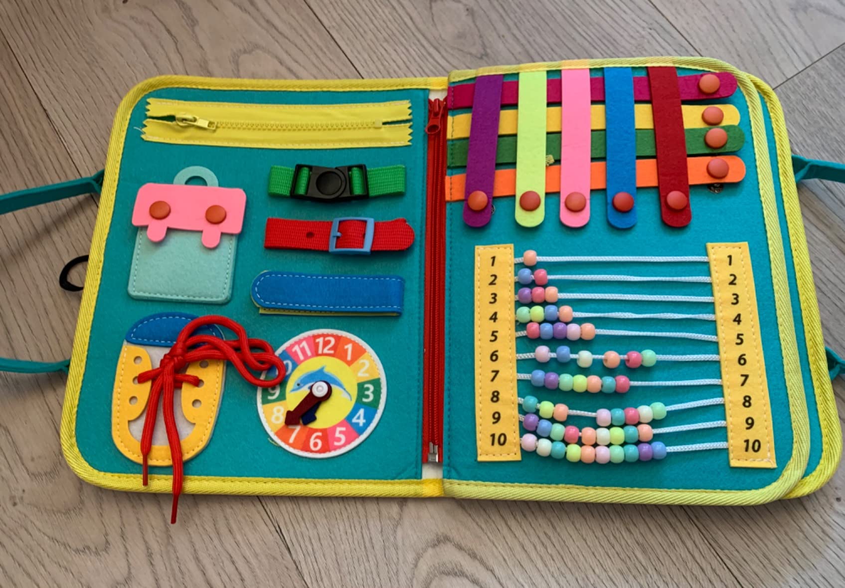Avis Planche d’activité Montessori Achiyway 4 couches pour bébé 1-4 ans : un jouet éducatif pour voyage et motricité fine