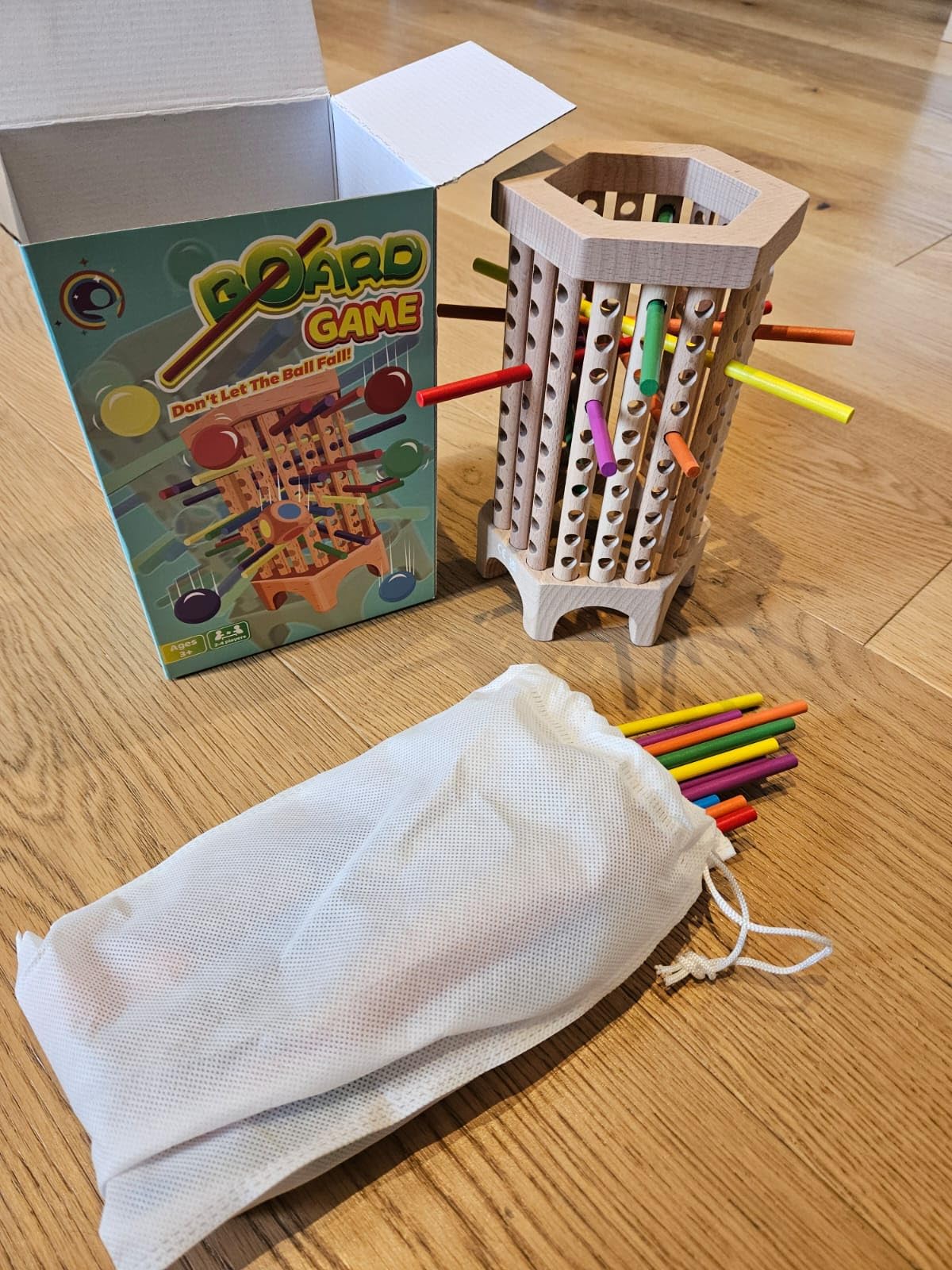 Avis Jeu de motricité Montessori pour enfants de 3 à 6 ans : tour en bois avec bâtonnets colorés