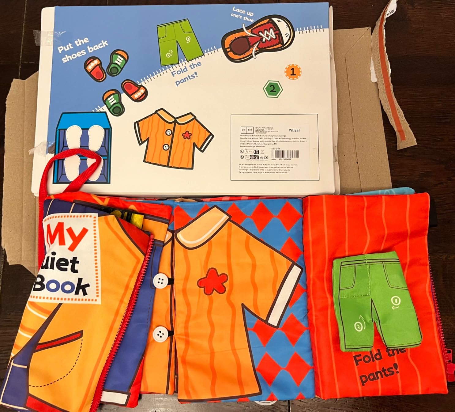 Avis Jouet montessori 1 an busy board en tissu doux pour motricité fine